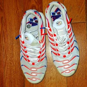 White and Orange Athletic Shoes